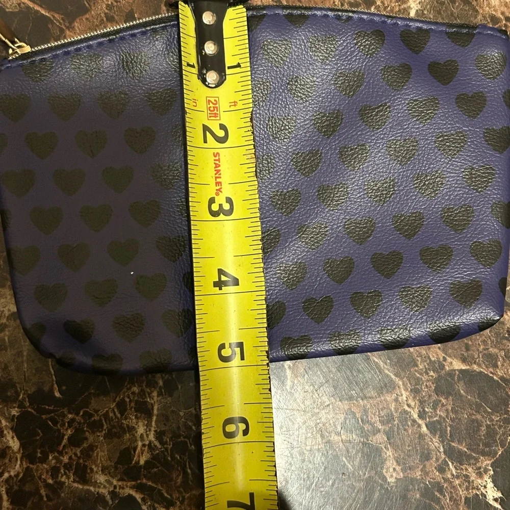 Ipsy indigo make up bag with black heart print